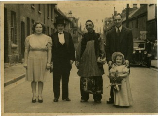 Iris Evans, as a young girl, enjoying the dressing-up for the VE Day Celebrations on Greencroft Street 1945 | Iris Evans (nee Beavis)