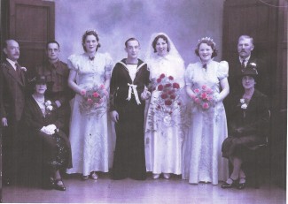 Phyllis married Reginald Percy Maple on 8 October 1941. They met at Salisbury station where they both worked and should have married in 1939 but the new bungalow that they wanted had been sold. By the time the wedding was able to take place war had been declared and Reginald was in the Royal Navy. Like most formal wedding photographs, this would have been taken at a studio after the ceremony. | Picture by kind permission of the Maple family