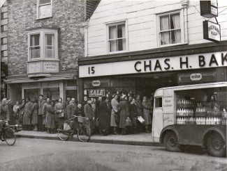 Chas H Bakers, Milford Street, in the 1950s. Notice the Rampart Road dairy milk float in the foreground. | Photo courtesy of Chas H Baker and Sons