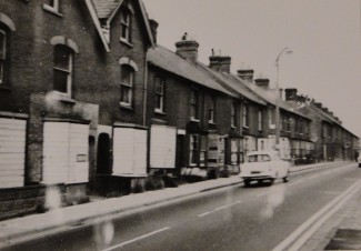 Rampart Road boarded up ready for demolition to make way for the Inner Relief Road | Picture with kind permission of The Salisbury Museum © Salisbury Museum