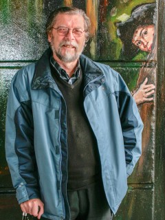 John Abbott at the official opening of the Jubilee Mural, next to his portrait in the mural | Anna Tooth