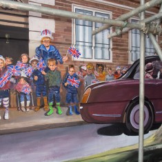 Children watching Her Majesty's car pass in the Jubilee Mural | John Palmer