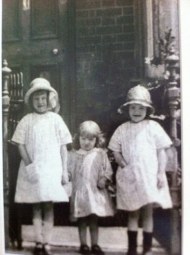 My mother and her sisters outside their house in Rampart Road. c. 1930. Left to right Norah (7 ), Barbara (4) and Freda (6) Ireland. My mother is on the right.