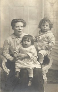 In this studio photograph,, Maud has a locket hanging from a chain around her neck, the portrait in the locket being similar to one mounted in a military button. Both show an upright young soldier, very different from the war weary man in the photograph taken towards the end of Walter's life. | By kind permission of the Jacob family