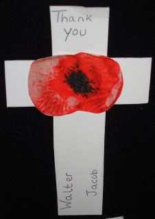 As part of the 2014 commemorations, local school children wrote messages on crosses, one for each Wiltshire man who died during the First World War. The young grandson of one of the clergy located Walter's cross when it was displayed in Salisbury Cathedral. | By kind permission of the Jacob family