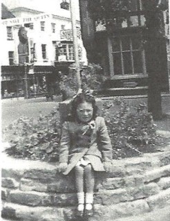 I think this photograph may have been taken in the Market Place on Coronation Day as some of the decorations in Winchester Street can be seen in the background. I started school several months later. | Photograph taken by Kenneth Jacob.