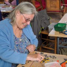 Volunteers on day 3 of making the Greencroft Street mosaic