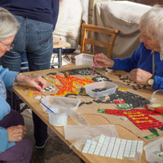 Volunteers on day 3 of making the Greencroft Street mosaic