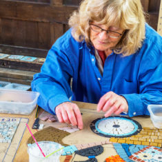 Volunteers on day 3 of making the Greencroft Street mosaic